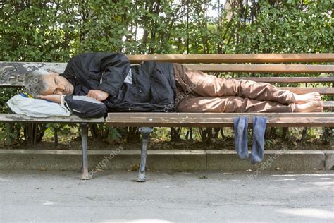 Homeless Sleeping On A Bench Stock Editorial Photo Belish