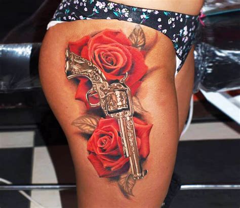 Gun And Roses Tattoo On Thigh