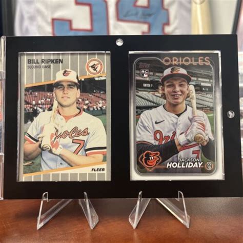 2024 Topps Series 2 Fun Face 697 Jackson Holliday And 1989 Billy Ripken