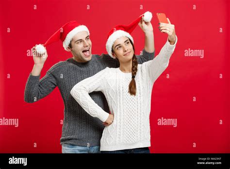 Christmas Concept Young Attractive Couple Taking A Selfie By Mobile