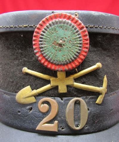 Stewarts Military Antiques - - Swiss WWI Pioneer Shako, - $150.00