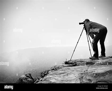 Wildlife Photographer On Mountain Summit Works Man Like To Travel And