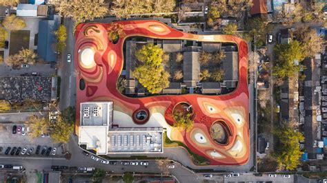 Mad Tops Beijing Kindergarten With Red Rooftop Playground