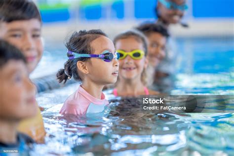 Kids Swimming Lessons Stock Photo - Download Image Now - Girls ...