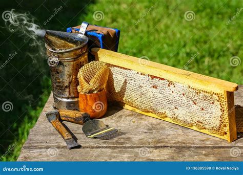 Beekeeper Working Tools on the Hive. Beekeeping Equipment on a Wooden ...