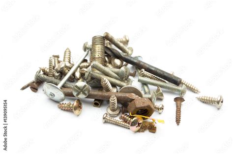 Old scrap metal, steel bolts isolate white background with copy space. Stock Photo | Adobe Stock