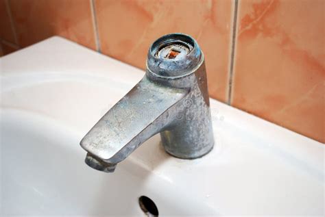 Old Broken Faucet Mixer Tap on Bathroom Sink. Stock Image - Image of ...