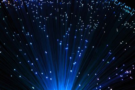 Premium Photo Close Up Of Illuminated Fiber Optic Against Black