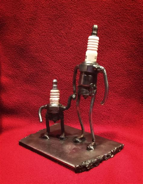 Fatherhood Scrap Metal Old Spark Plugs And A Discarded Throttle Linkage Junk Art Sculpture