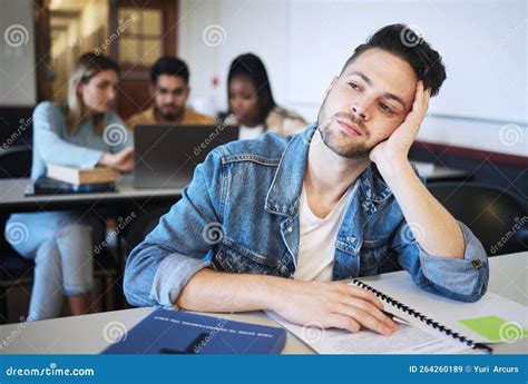 Education University And Bored Student In Classroom Thinking Studying