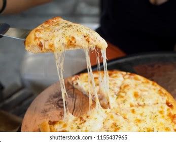 Cheese Pull Pizza Images, Stock Photos & Vectors | Shutterstock