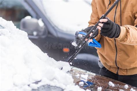 Man Cleaning His Car From Snow Stock Photo Image Of Manually Cold