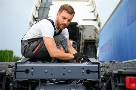 Mechanic Repairing The Truck In Service Stock Photo Image Of