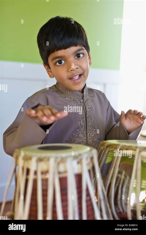 Indian Boy Playing Drums Stock Photo Alamy