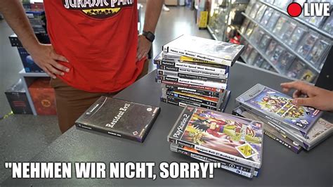 ER KAUFT VIDEOSPIELE UND KONSOLEN IM RETRO LADEN AN Deantramp