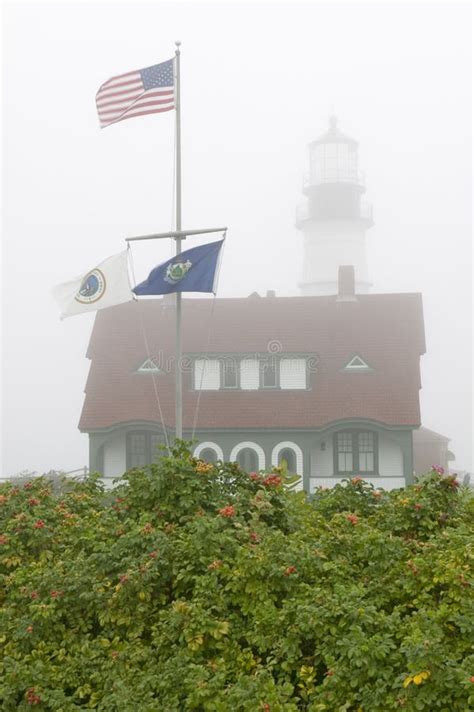 Fog Shrouds The Portland Head Lighthouse In Cape Elizabeth Maine Stock