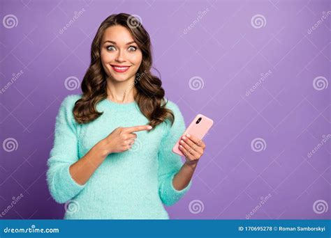 Photo Of Funny Pretty Lady Hold Telephone Hands Indicating Finger On