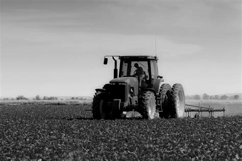 Farmer Plowing The Field - Aprotech Aprotech