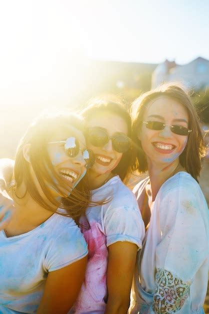 Premium Photo A Group Of Friends Have Fun Dance At Holi Festival