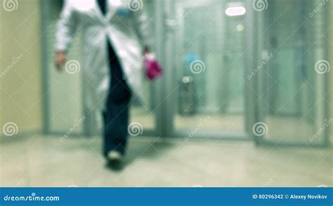 Blurred Lab Worker Wearing White Gown Leaving Hospital Laboratory 4k