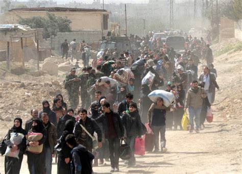 Syrians Flee Besieged Enclaves In Largest Single Day Exodus