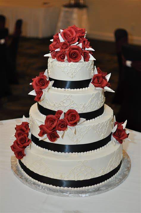 Konditor Meister Wedding Cake with Red Sugar Roses and Black Ribbon