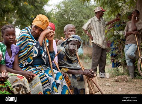 Villagers Wait Outside A Medical Dispensary In Tanzania Manyara Region