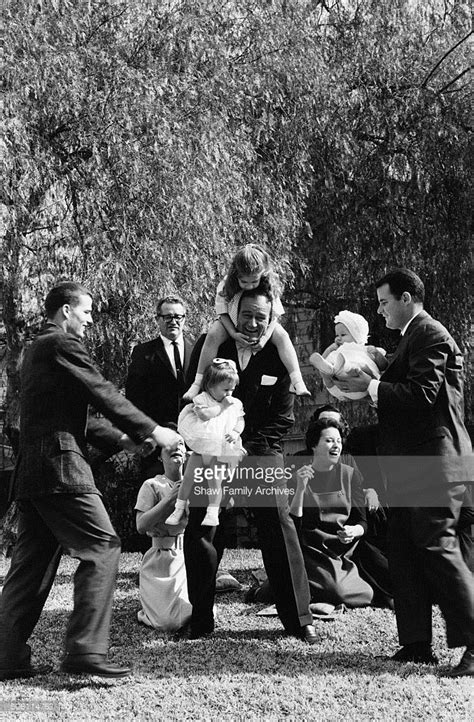 John Wayne at home with his children and grandchildren in 1960 in ...