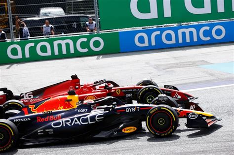 Max Verstappen Red Bull Racing Rb19 And Charles Leclerc Ferrari Sf