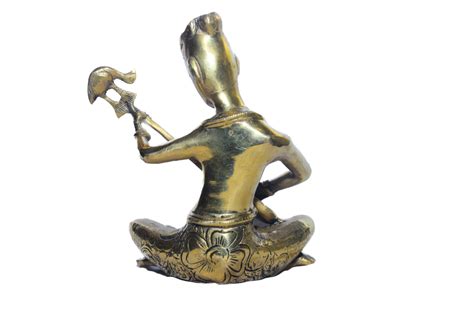 Decorative Brass Man playing Sarod - BronzeWare - Timeless Royal Elegance