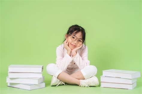 Premium Photo Portrait Of Asian Child On Green Background