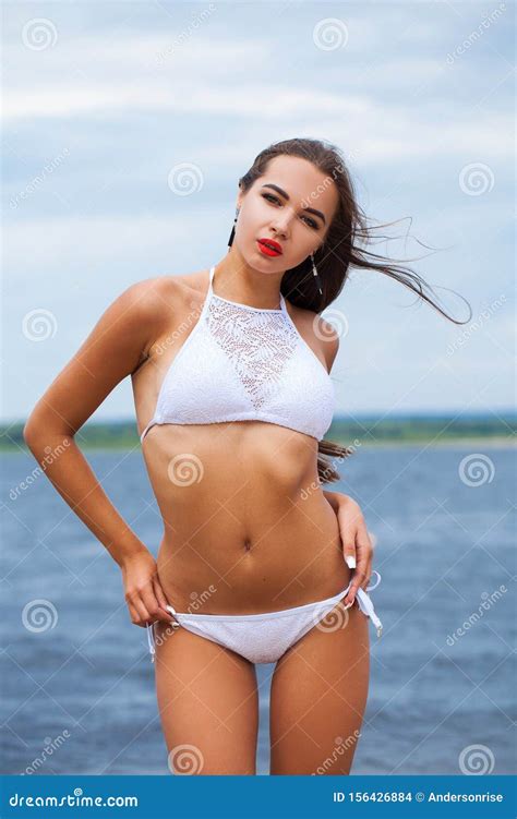 Close Up Portrait Beautiful Brunette Woman In White Bikini Stock Photo