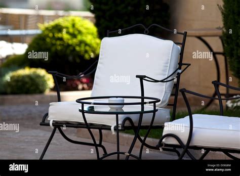 Stylish garden furniture in a charming French garden Stock Photo - Alamy