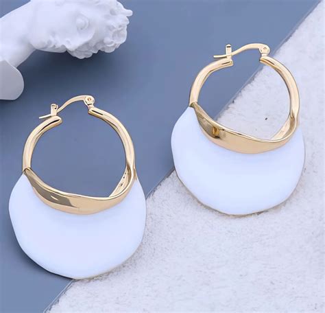 Trending Basket Hoop Earrings In White And Gold