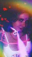 Redhead Chick Syd Sativa Shows Her Big Round Tits While Posing 15 Photos