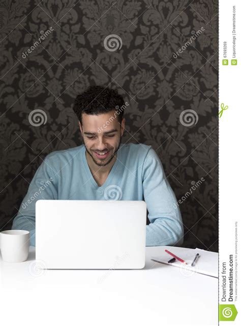 Happy Man Using A Laptop Stock Image Image Of Online 67693269