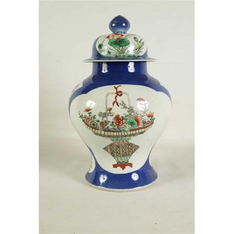 A 19TH CENTURY CHINESE POWDER BLUE GROUND FAMILLE VERTE VASE AND COVER