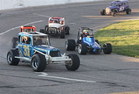 Auto racing: Veteran driver Rick Smith gets win using his father's modified car