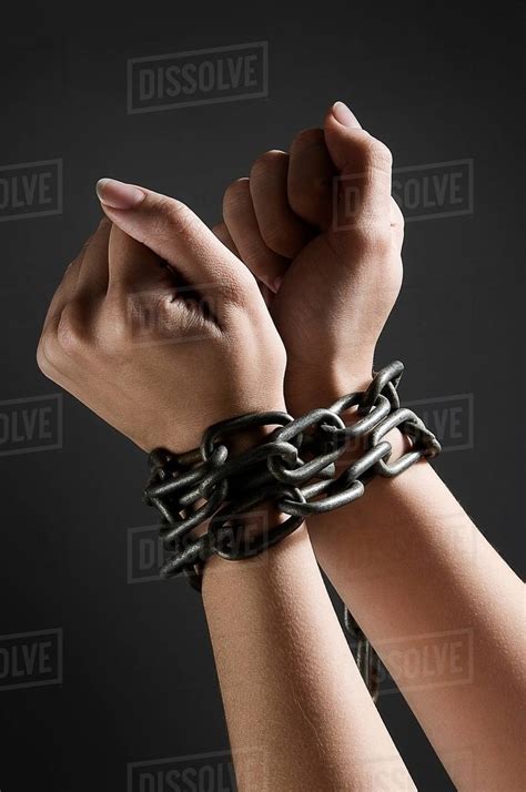 Female Hands Chained Together Stock Photo Dissolve