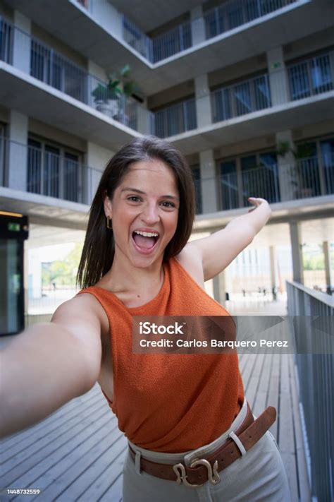 Pov Vertical Selfie Outside Of A Cheerful Smiling Young Caucasian Woman Stock Photo - Download