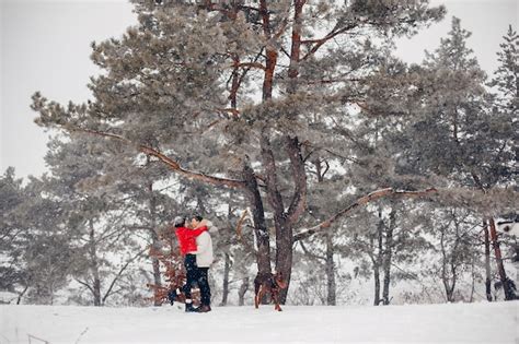 Free Photo | Loving couple walking in a winter park