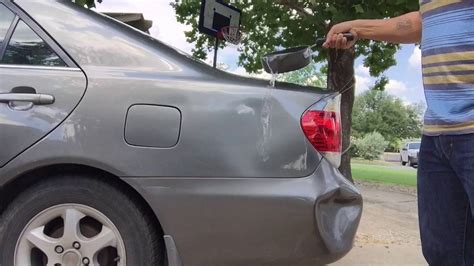 How To Pull A Dent Out Of A Metal Bumper