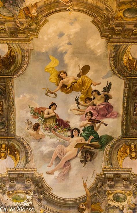 An Ornate Painting On The Ceiling Of A Building