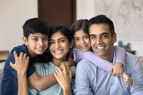 portrait  parents    children posing  camera stock