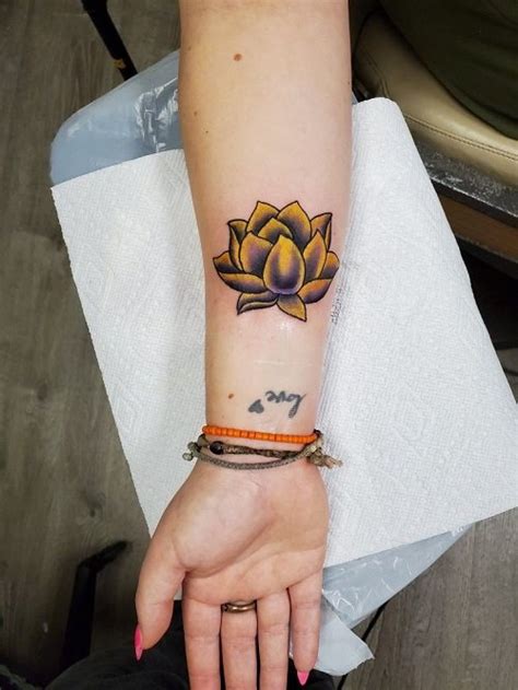 Lotus Flower Tattoo Meaning and Symbolism