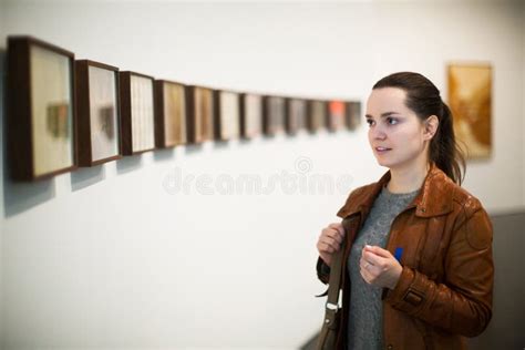 Brunette Woman in Art Museum Stock Photo - Image of exhibits, jacket ...