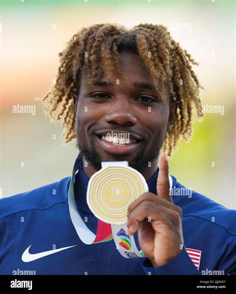 Usas Noah Lyles Celebrates With His Gold Medal Following The Mens