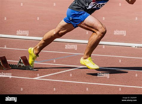 Legs Sprinter Runner Start From Starting Blocks Running In Track