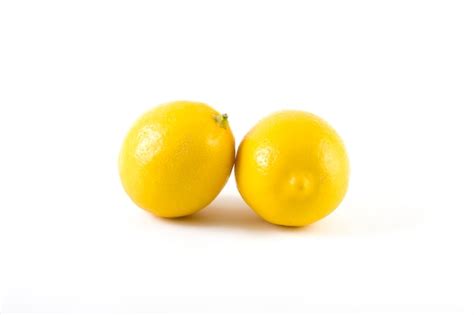 Premium Photo Ripe Lemons Isolated Close Up