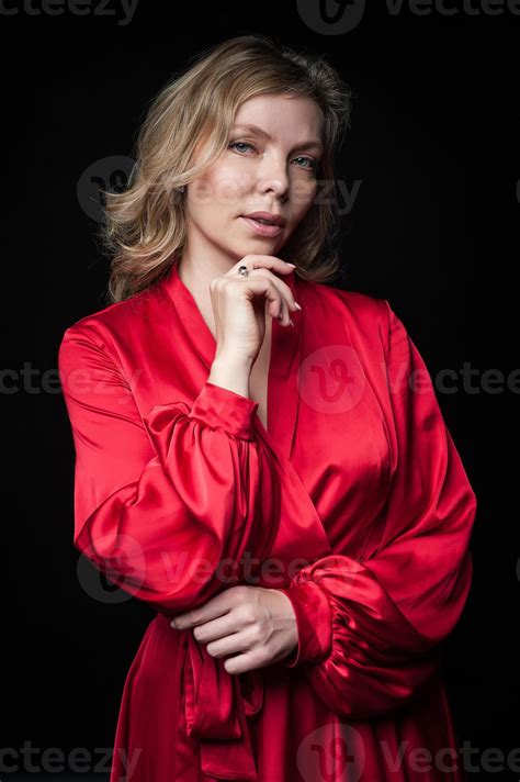 Sexy Blonde In Red Dress In Studio Stock Photo At Vecteezy